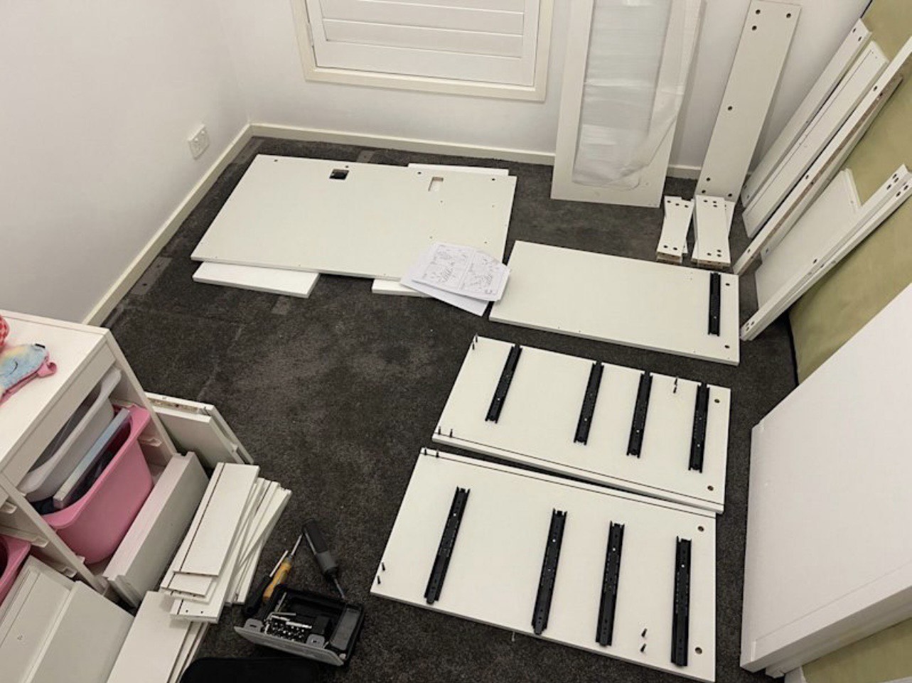 Flatpack parts laid out and ready for assembly